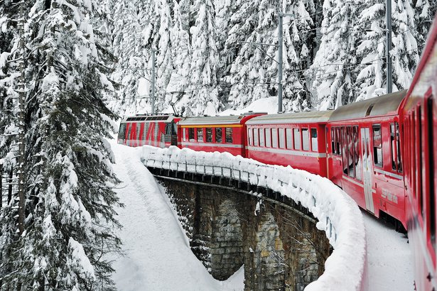 The snow-covered mountains and punctual trains of Montreux, Switzerland, summon childhood train sets, and the daydreams that accompanied them. (Harold Cunningham/Getty)