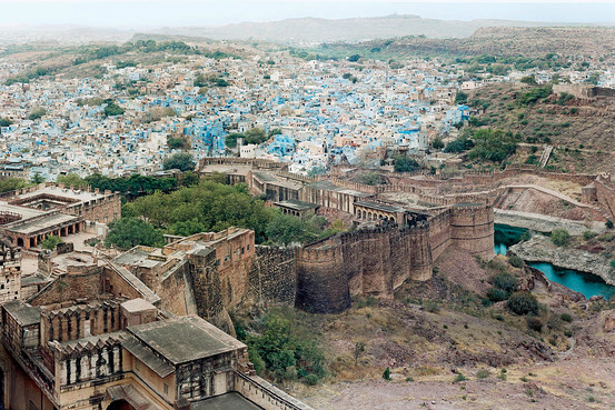 Photography by Robert Polidori.  BLUE HEAVEN | Built in the 15th century by Rao Jodha, the walls of the fortress of Mehrangarh are 70 feet thick. Many of the houses of Jodhpur are painted blue to deflect the sunlight, and, according to folklore to repel insects.