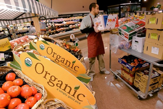 Associated Press photo. Organic foods have made big inroads in supermarkets like this Hannaford store in Quincy, Mass.