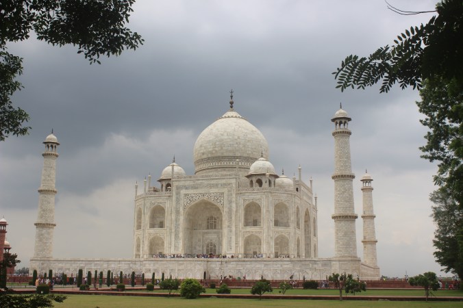 A view of the Taj Mahal beneath the cloudy skies