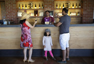 Kuni Takahashi for The New York Times. Sampling the product at York Winery.