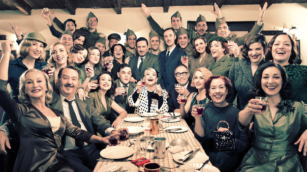 Greek vocal icon Marinella, center, sings "Children of Greece," a song once sung to Greek soldiers as Italian and German forces invaded the country. As they endure hard times today, Greeks are turning to theater that shows triumphs over adversity in the last century.