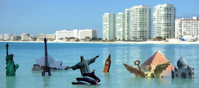 A Greenpeace protest juxtaposed the drowning of some of the world's most iconic structures with Cancun, Mexico's, rising skyline. Juan Barreto/AFP/Getty Images