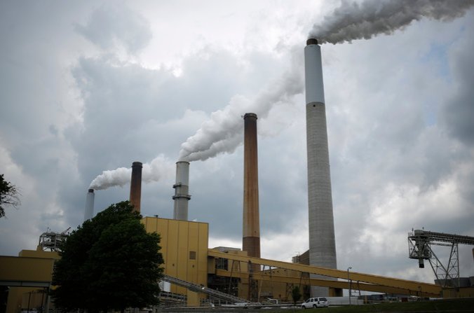 Carbon dioxide emissions like those from coal-fired power plants should be taxed to spur energy innovation. Credit Luke Sharrett for The New York Times
