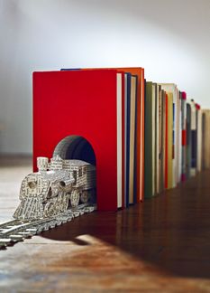 In a climate of embattled bibliophilia, authors have been undertaking reading stunts to prove that reading—anything—matters. Construction by Stephen Doyle.