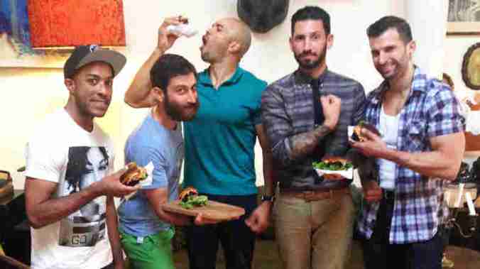 Mixed martial arts fighter Cornell Ward (from left), chef Daniel Strong, triathlete Dominic Thompson, lifestyle blogger Joshua Katcher and competitive bodybuilder Giacomo Marchese at a vegan barbecue in Brooklyn, N.Y. Courtesy of James Koroni