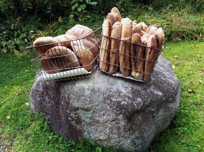 Rabin bread on a rock at the farmers market in Plainfield prior to setting up the table. Jon Kalish for NPR