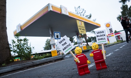 Mini activist figures at a Shell gas station in Legoland in Billund, Denmark, part of a global campaign targeting Lego and highlighting Shell’s plans for Arctic oil exploration. Photograph: Uffe Weng/Greenpeace