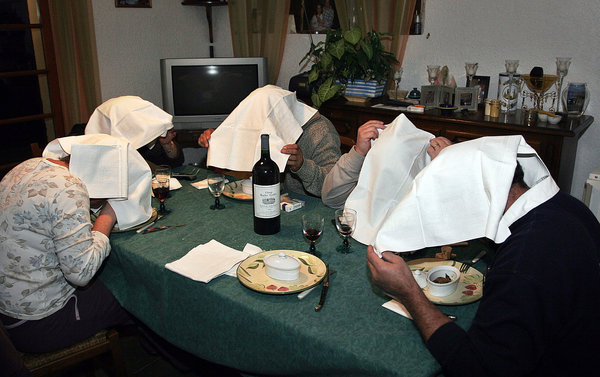 Guests eating ortolan at a private dinner party in southwestern France after the bird was banned from restaurant menus. Credit Richard Cottenier/MAXPPP