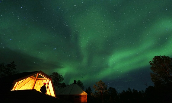 Northern lights over a camp north of the Arctic Circle, October 2014 (Yannis Behrakis/Reuters) 