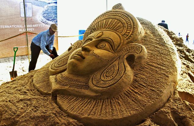 An artist prepares a sand installation at the Alappuzha beach during the trial run of the international sand art festival that will be held in April.– Photo: By Special Arrangement