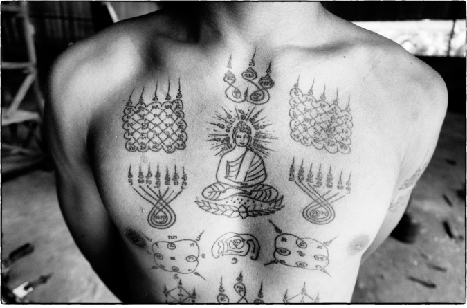 Believed to ward off bad luck, sacred tattoos or sak yant have centuries of history in Southeast Asia. PHOTO: Nathan Thompson 