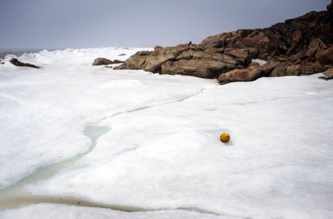 Even in late June, ice clotted Frobisher Bay in Iqaluit, where teams from across Nunavut met to compete in a soccer tournament.PHOTO: Ian Willms for The New York Times