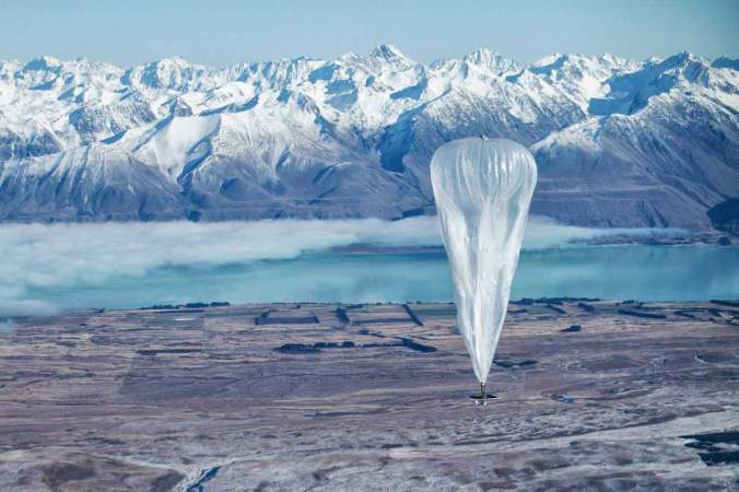 In this June 10, 2013 photo released by Jon Shenk, a Google balloon sails through the air with the Southern Alps mountains in the background, in Tekapo, New Zealand (AP Photo/Jon Shenk) 