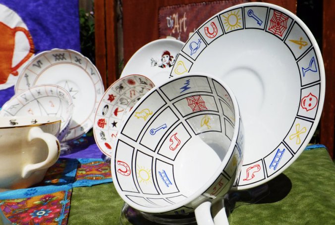 On Canadian tasseomancer Amy Taylor's vintage tea-leaf reading cups, your reading is determined by where your leaves fall on the preprinted symbols on the cups. PHOTO: Mike Taylor for NPR