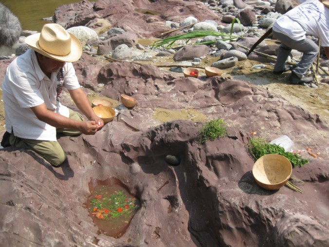 Chinatec elders prepare stone soup the traditional way, by the Papaloapan River. PHOTO: SARAH BOREALIS