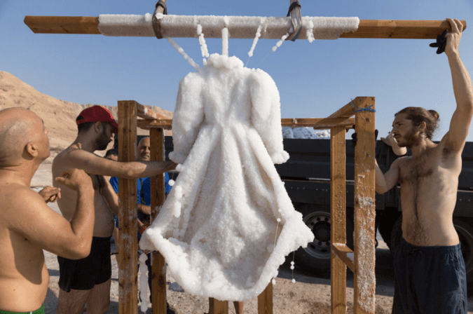 The project was inspired by “The Dybbuk”: S. Ansky’s 1916 drama of star-crossed love and exorcism rooted in Jewish folklore. The dress is a copy of that worn by the actress Hannah Rovina, for whom the play’s lead became a signature role in the 1920s. The salt added hundreds of pounds of extra weight over the course of three months. Matanya Tausig